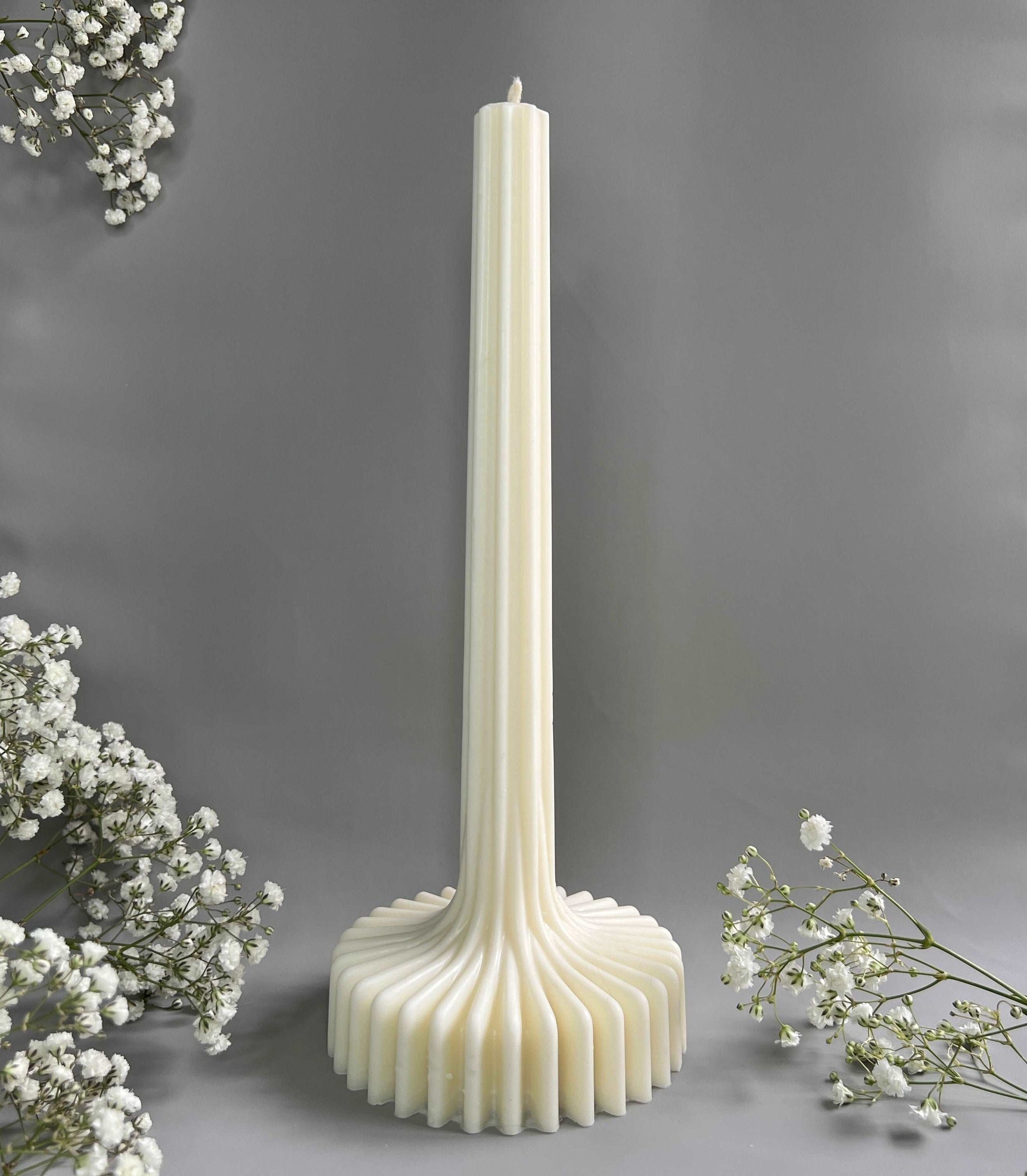 Tall Ribbed Tapper candle with flat bottom